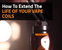 How to Extend the Life of Your Vape Coil – clean coil with vape pen and e-liquid bottle on wooden table